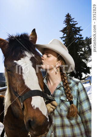 Attractive Young Woman Kissing Horse Attractive Young Woman Kissing Horse 3352829