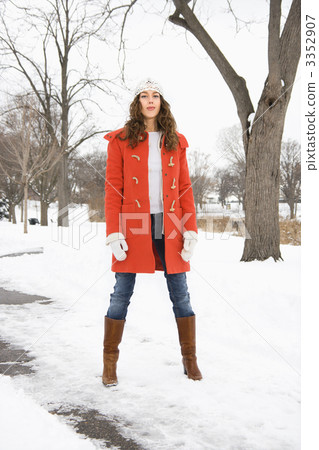 Woman in snowy street. 3352907