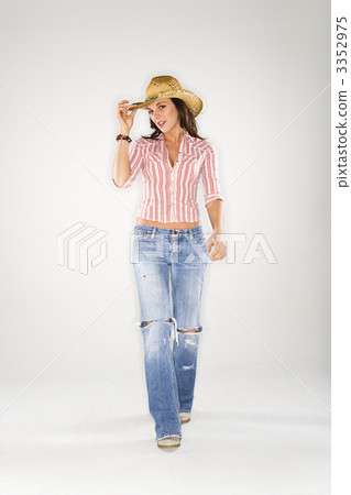 Woman tilting hat. Woman tilting hat. 3352975