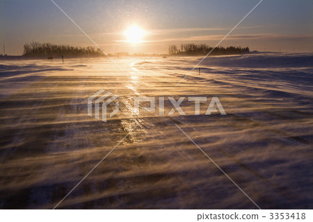 Icy road at sunrise. 3353418