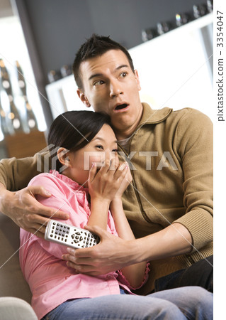 Couple watching TV. Couple watching TV. 3354047