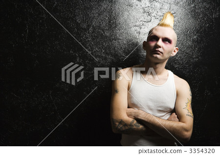 Punk with crossed arms. 3354320