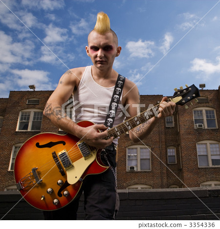Punk playing guitar. 3354336