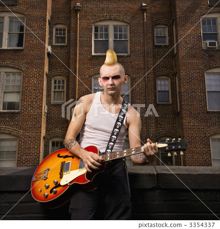 Punk playing guitar. 3354337