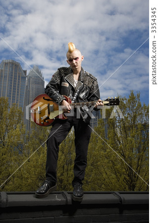 Punk playing guitar. 3354345