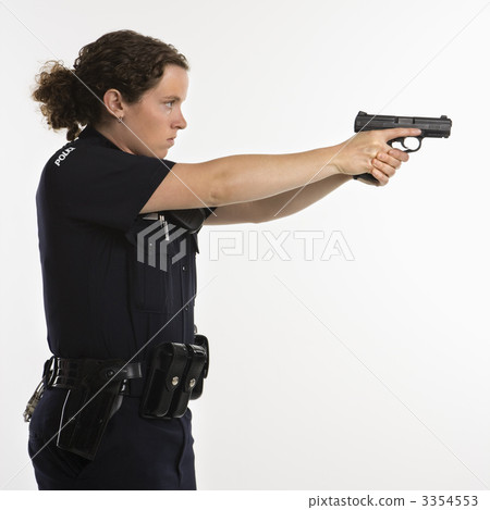 Policewoman aiming gun. 3354553