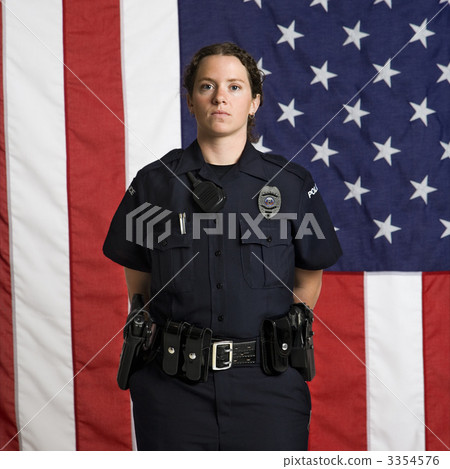 Policewoman and flag. 3354576