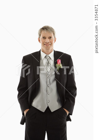 Groom in tuxedo. 3354871
