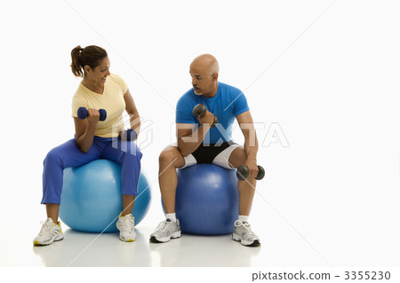 Man and woman exercising. 3355230