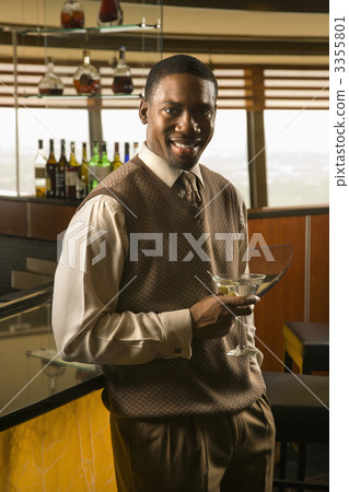 Man drinking martini. 3355801