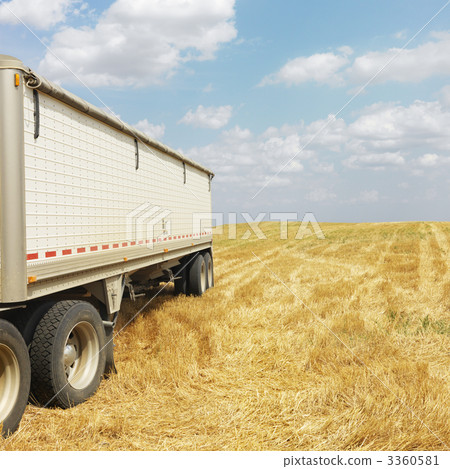 Tractor trailer truck in field. Tractor trailer truck in field. 3360581