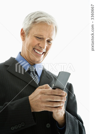 Businessman text messaging. 3360667