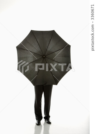 Man behind umbrella. 3360671