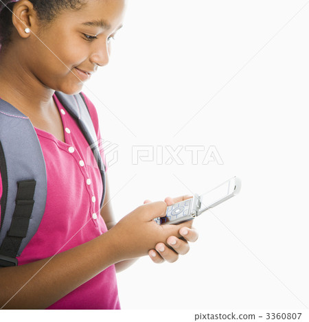 Schoolgirl with phone. Schoolgirl with phone. 3360807