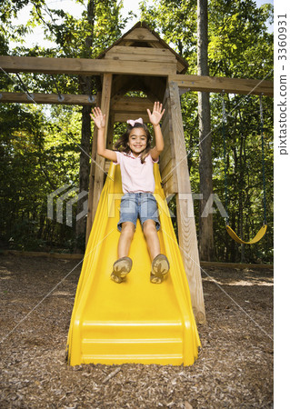 Happy girl sliding. 3360931