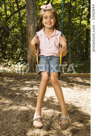 Girl swinging on swing. Girl swinging on swing. 3360944