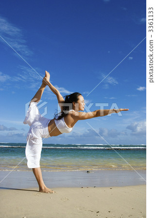 Woman Doing Yoga on Beach 3361133