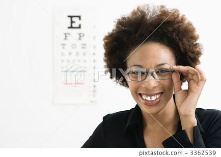 Woman at eye doctor Woman at eye doctor 3362539