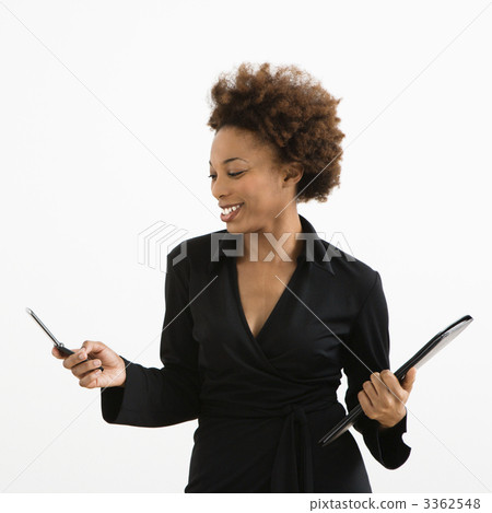 Businesswoman with cellphone Businesswoman with cellphone 3362548