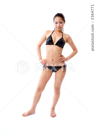 A young woman in a bathing suit A young woman in a bathing suit 3364771