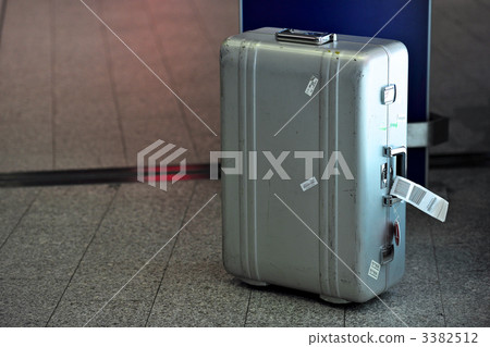 Metallic suitcase of overseas travel and business image 3382512