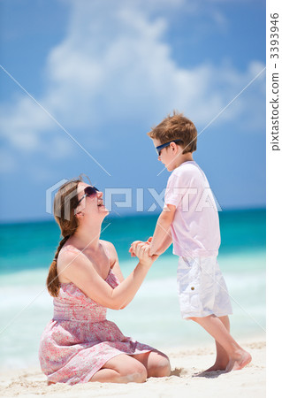 Mother and son at beach Mother and son at beach 3393946