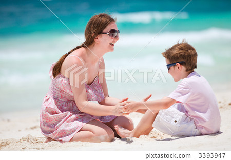 Mother and son at beach 3393947