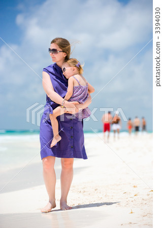 Mother and daughter at beach 3394030