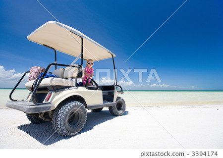 Golf cart at tropical beach 3394174
