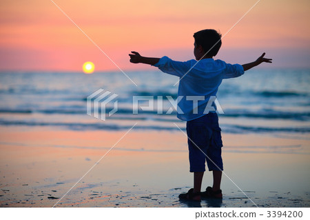 Little boy at sunset Little boy at sunset 3394200