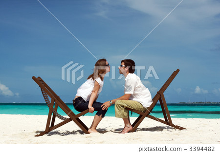 Young couple on the beach 3394482