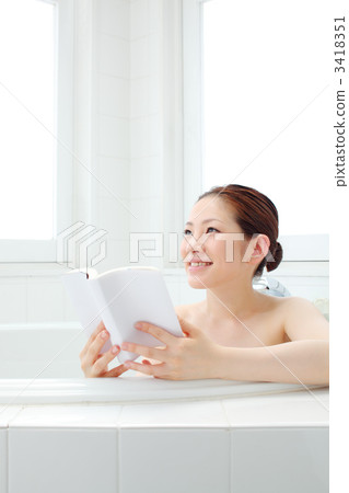 Girls using smartphones in the bathroom Girls using smartphones in the bathroom 3418351