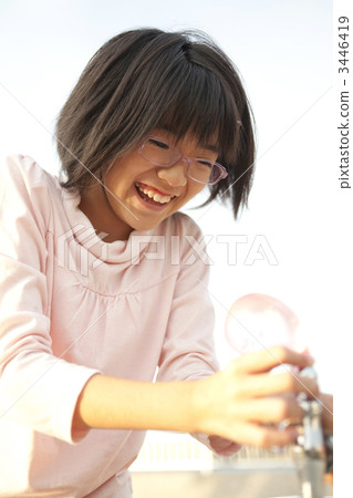 Girls playing with water balloons 3446419