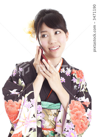 A woman who places a mobile phone A woman who places a mobile phone 3471190