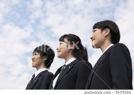 A high school student looking far away under the blue sky 3479384