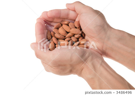 Hand wrapping almonds Hand wrapping almonds 3486496