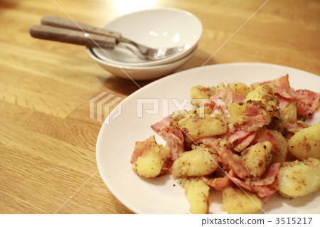 Homemade German potatoes and a side dish Homemade German potatoes and a side dish 3515217