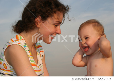 mother with baby sundown 2 3532993