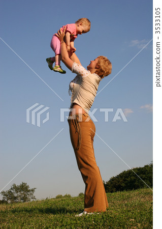 baby on mother's hands baby on mother's hands 3533105