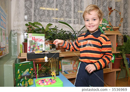 child in kindergarten fishing 3536969