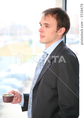 businessman with coffee and window 3538478