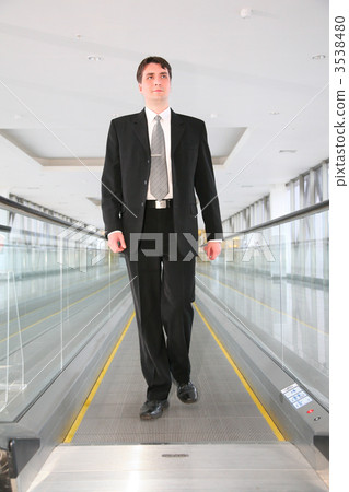 businessman on escalator 3538480