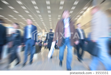 Moving people in business center 3553331