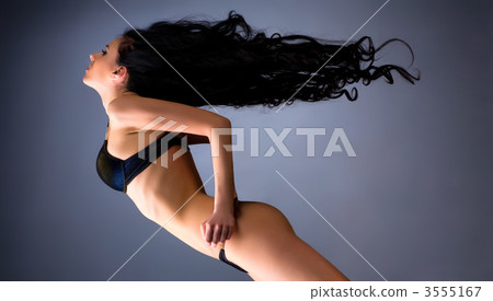 Young woman with fluttering hair 3555167