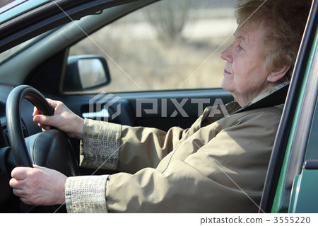 Elderly woman-driver in car 3555220