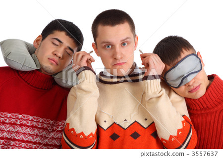 Two sleep, third inserts into plug ears 3557637