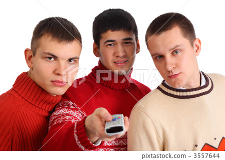 Three friends with remote control 3557644