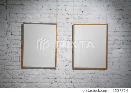 two frame on brick wall 3557754
