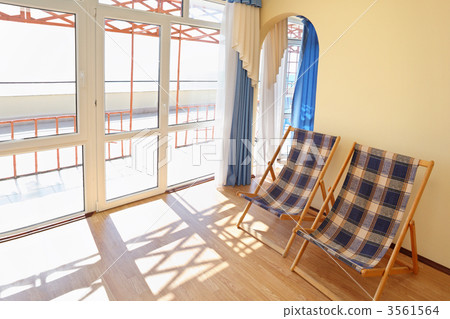 Cosy hotel room with chaise lounges Cosy hotel room with chaise lounges 3561564