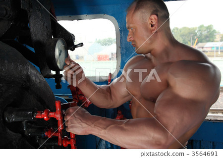 athlete in locomotive cabin 3564691